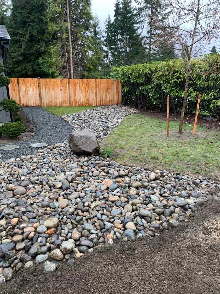 retaining wall and residential fence install job with ivans