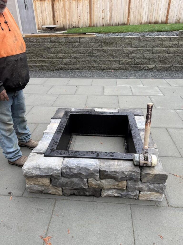 Fire pit and stone hardscape patio installation in Snohomish County by Ivan's Landscape & Construction