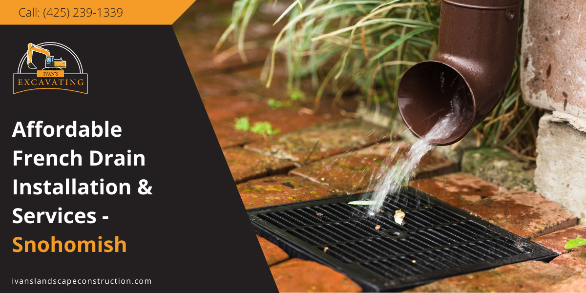 Water flowing from gutter into a French drain system.