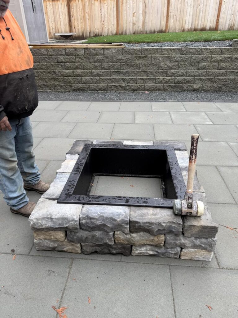 fireplace and stone hardscape patio installed with ivans landscaping in Snohomish County Washington