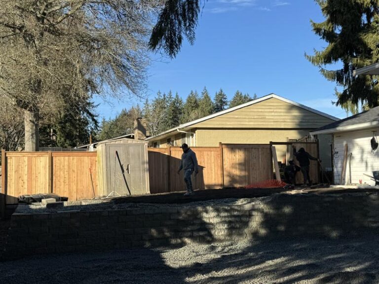 retaining wall and new wooden fence installation with ivans landscape and construction