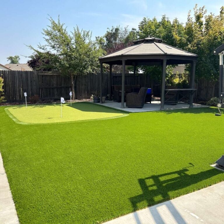 Backyard with gazebo and artificial putting green