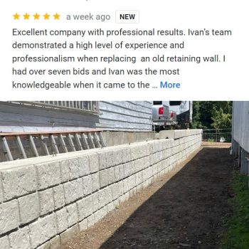 Newly constructed retaining wall beside rural house