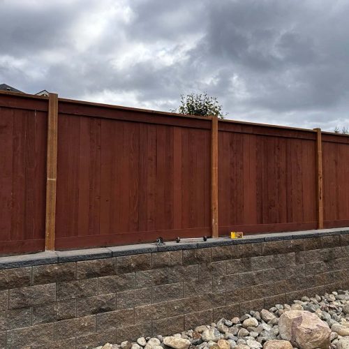 retaining wall and residential fence install job with ivans